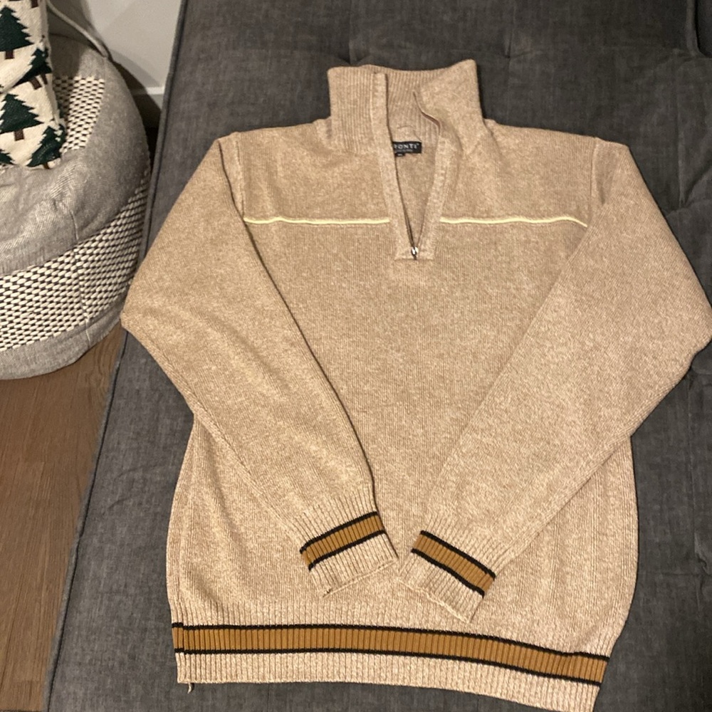 Beautiful sweater. Like new